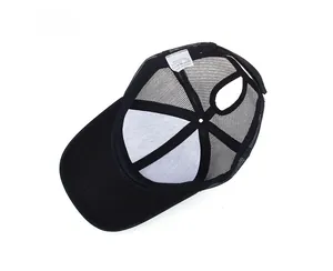 Internal view of mesh ponytail baseball cap showing the cotton polyester wash label