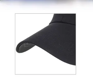Detail shot of black baseball cap brim showing reinforced stitching and twill fabric