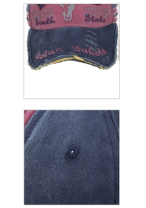 Close-up of distressed washed cotton baseball cap with vintage letter embroidery and stitching