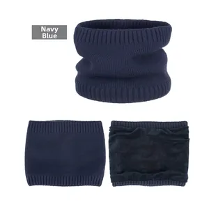 Detail of navy blue knitted neck warmer showing thermal fleece lining and ribbed texture