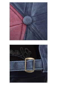Detail of vintage washed cotton baseball cap showing metal buckle and stitching