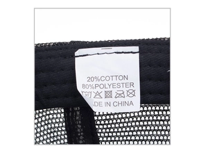 Detail of the washing label showing 20% cotton and 80% polyester mesh fabric material