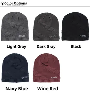 Close-up of winter knitted beanies featuring geometric texture and sports logo embroidery