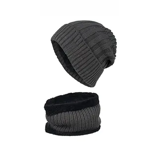 Winter thermal set featuring dark grey ribbed knit beanie and fleece neck warmer