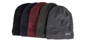Close-up of five knitted beanies with sports logo in black, navy, red, green and grey