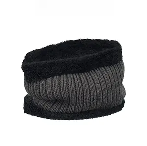 Close-up of grey knitted neck warmer with black fleece lining for winter warmth