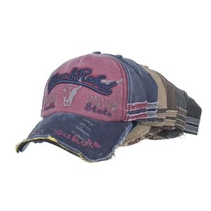 Distressed washed cotton baseball cap with Black Rebel embroidery and vintage frayed brim