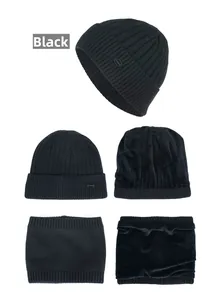 Detail of black ribbed knit beanie and neck warmer set with warm fleece lining and logo