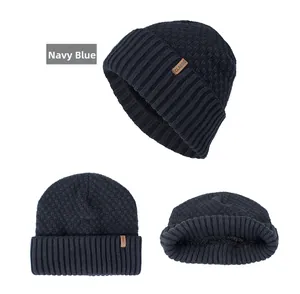 Detail view of navy blue beanie with fleece lining and Classic label for winter warmth