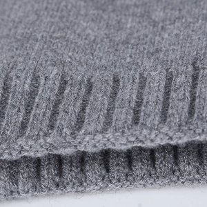 Winter grey ribbed knit neck warmer with soft fleece lining and thick wool texture