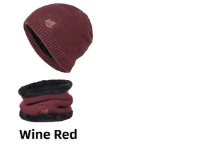 Detail of wine red knit beanie and scarf set featuring warm fleece lining and maple leaf logo