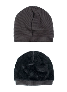 Detail of winter knitted beanie with thermal fleece lining and leaf embossed pattern