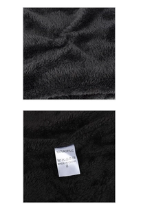 Detailed macro view of 100% acrylic fleece lining and wash label for knit beanie