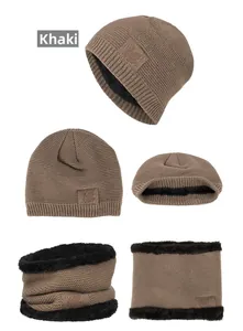Close-up of khaki knitted beanie and neck warmer set with thick black fleece lining