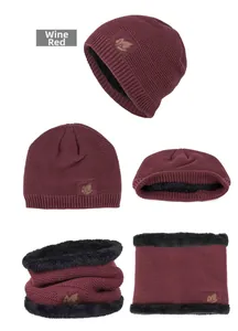 Detail of wine red knit winter hat and neck warmer set with thick black thermal fleece lining