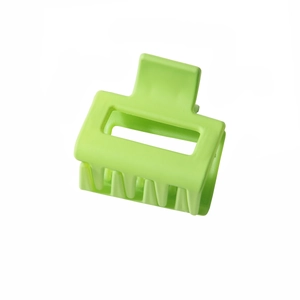 Pince à cheveux rectangulaire vert citron mat pour coiffure élégante sur fond blanc