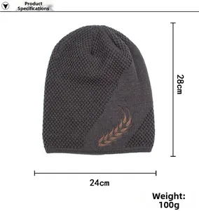 Detail view showing dimensions of dark brown knit beanie with wheat ear embossed pattern