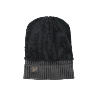 Winter thermal knit beanie featuring dual-tone fleece top and leaf logo leather patch