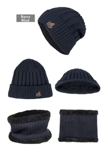 Navy blue winter knit set showing maple leaf patch detail and thick plush lining texture