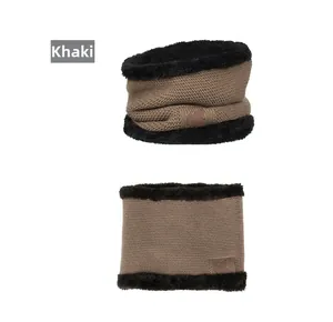 Detail of khaki winter neck warmer showing cable knit pattern and faux fur lining