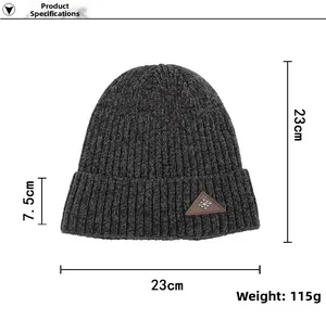 Detail view of dark grey chenille knit beanie with snowflake leather patch dimensions
