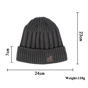 Dark gray knitted beanie with leather leaf logo and detailed size measurements in cm