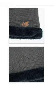 Detail view of winter knitted neck gaiter with plush lining and embossed leaf logo