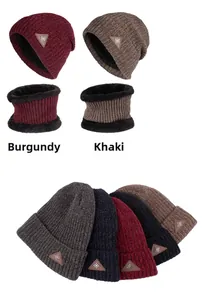 Close-up of winter knit beanie and neck warmer set with fleece lining and snowflake patch