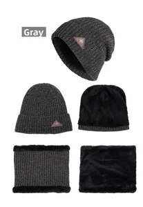 Detail view of grey knit beanie and neck warmer set with warm fleece lining