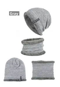 Detailed view of gray knit beanie and scarf set with thick warm faux fleece lining