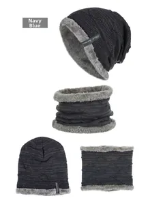 Detail view of navy blue knitted hat and neck warmer set with thick grey fleece lining
