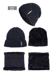 Detail view of navy blue cable knit winter hat and neck gaiter set with thick fleece lining