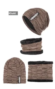 Detailed macro view of khaki knit beanie and neck warmer with thick black fleece lining