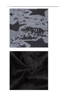 Vue détaillée du tricot gris avec étoiles et doublure en polaire noire épaisse