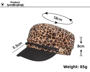 Detail view of leopard print beret hat with dimensions and black cord embellishment
