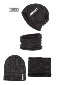 Detail of black knitted beanie and snood set with soft fleece lining for winter warmth