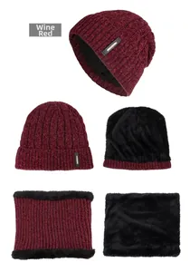 Detail of burgundy cable knit beanie and neck warmer set with thick black fleece lining