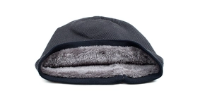 Detail of warm grey herringbone knit beanie with thick plush fleece lining for winter