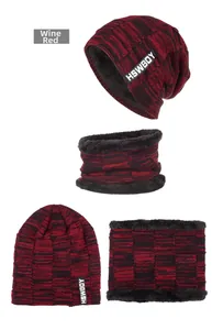 Detailed view of the warm wine red winter knitted hat and scarf set with thick fleece lining