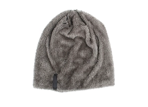 Close-up of gray plush knit beanie and neck warmer with soft faux fur texture