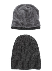 Detail of warm grey winter knit beanie with thick fleece lining and cable knit texture