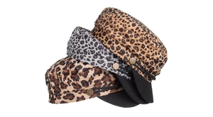 Detailed close-up of leopard print cadet caps in brown, grey and coffee colors with metal buttons