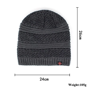 Winter dark grey knit beanie featuring a red snowflake fabric label and thick ribbed texture