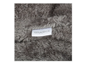 Close-up of 100% acrylic gray faux fur texture and soft material washing label
