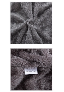 Detail of 100% acrylic fleece lining and wash label on dark grey chenille winter hat