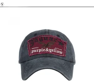 Close-up of vintage washed baseball cap featuring detailed eagle patch embroidery