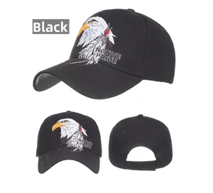 Detailed close-up of native pride eagle head embroidery on a black baseball cap