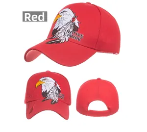 Detail view of red baseball cap featuring intricate eagle embroidery and Native Pride text