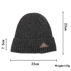 Winter chenille knit beanie hat with snowflake leather patch and product measurements