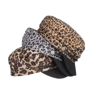 Three pieces of stylish leopard print newsboy caps in tan, grey, and dark brown colors